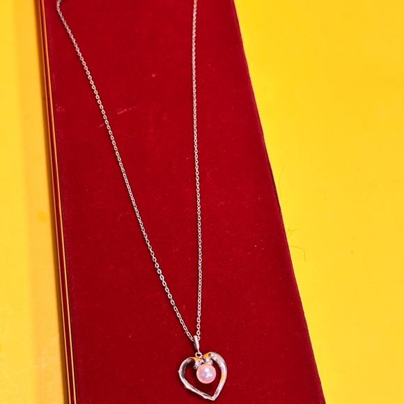 Mikimoto Silver Heart Necklace with Pearl
925 silver made. - Picture 11 of 12